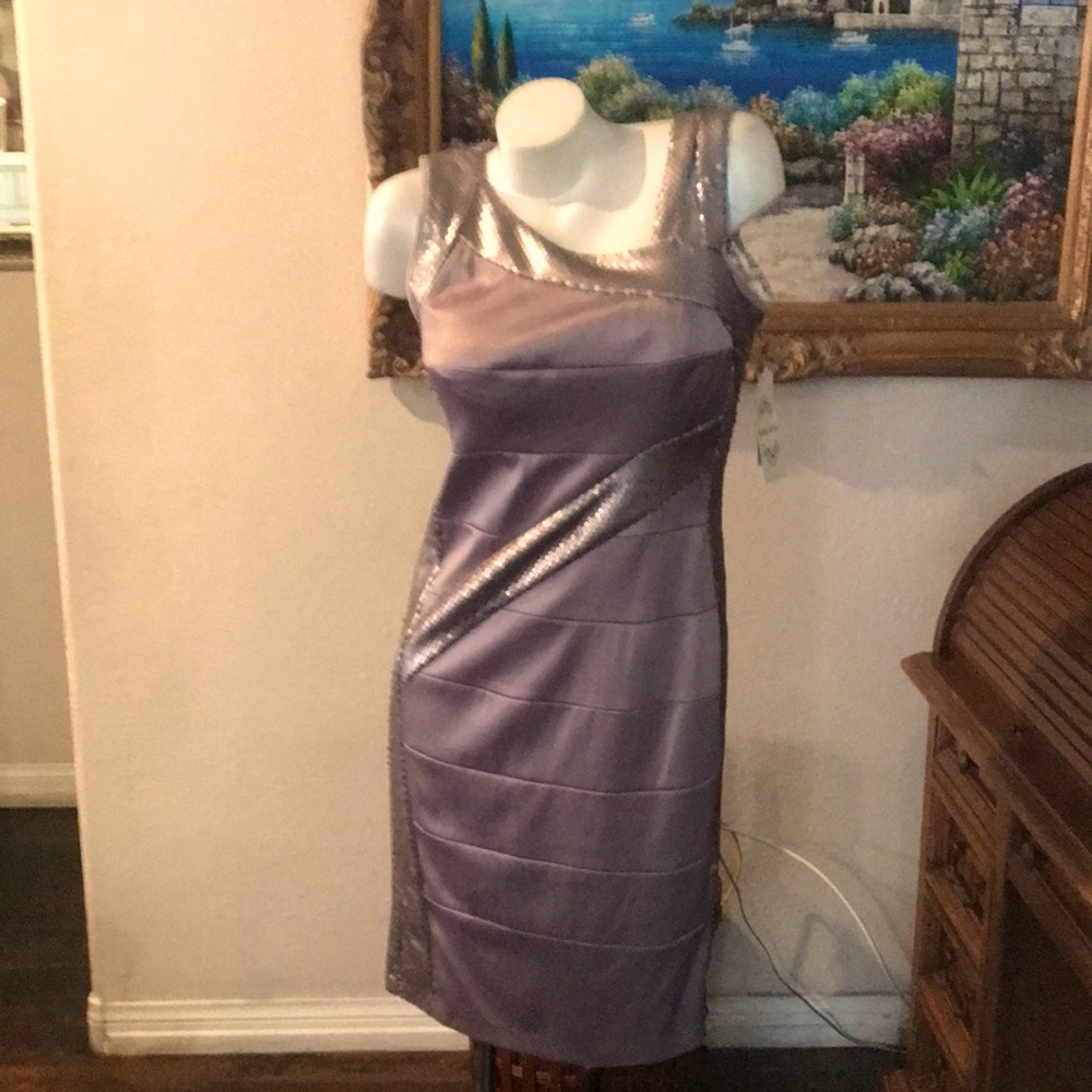 Gorgeous in gray !! To look sharp at your holiday party . Amazing fit